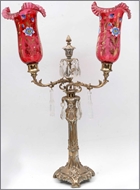 Picture of A heavily casted Colonial style EPNS two branch candle stand (lot 17)