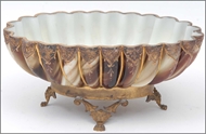 Picture of A Continental glass centre piece in the shape of a shell (lot 36)