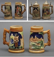 Picture of A collection of three pairs of German Majolica mugs
