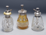 Picture of Three cut - glass perfume bottles