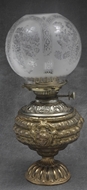Picture of A Georgian cast-iron gold painted oil lamp
