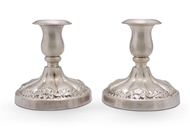 Picture of A pair of silver dwarf candlesticks