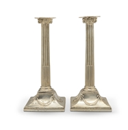 Picture of A pair of George III silver ionic column candlesticks