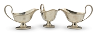 Picture of A set of three English Hallmark silver sauce boats