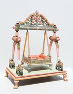 Picture of A CARVED AND PAINTED TEMPLE CRADLE (PALKI) SWING