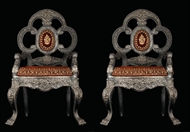 Picture of A VERY FINE PAIR OF INDIAN SILVER AND GOLD GILTED CEREMONIAL CHAIRS